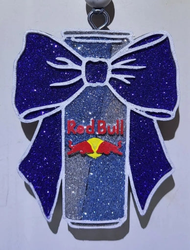 Red Bull bottle with a large blue bow on a white background