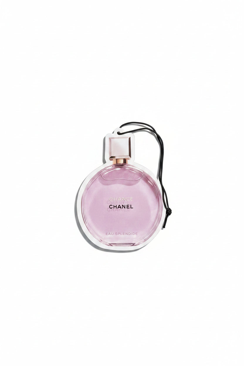 Chanel perfume car air freshener on a reflective surface