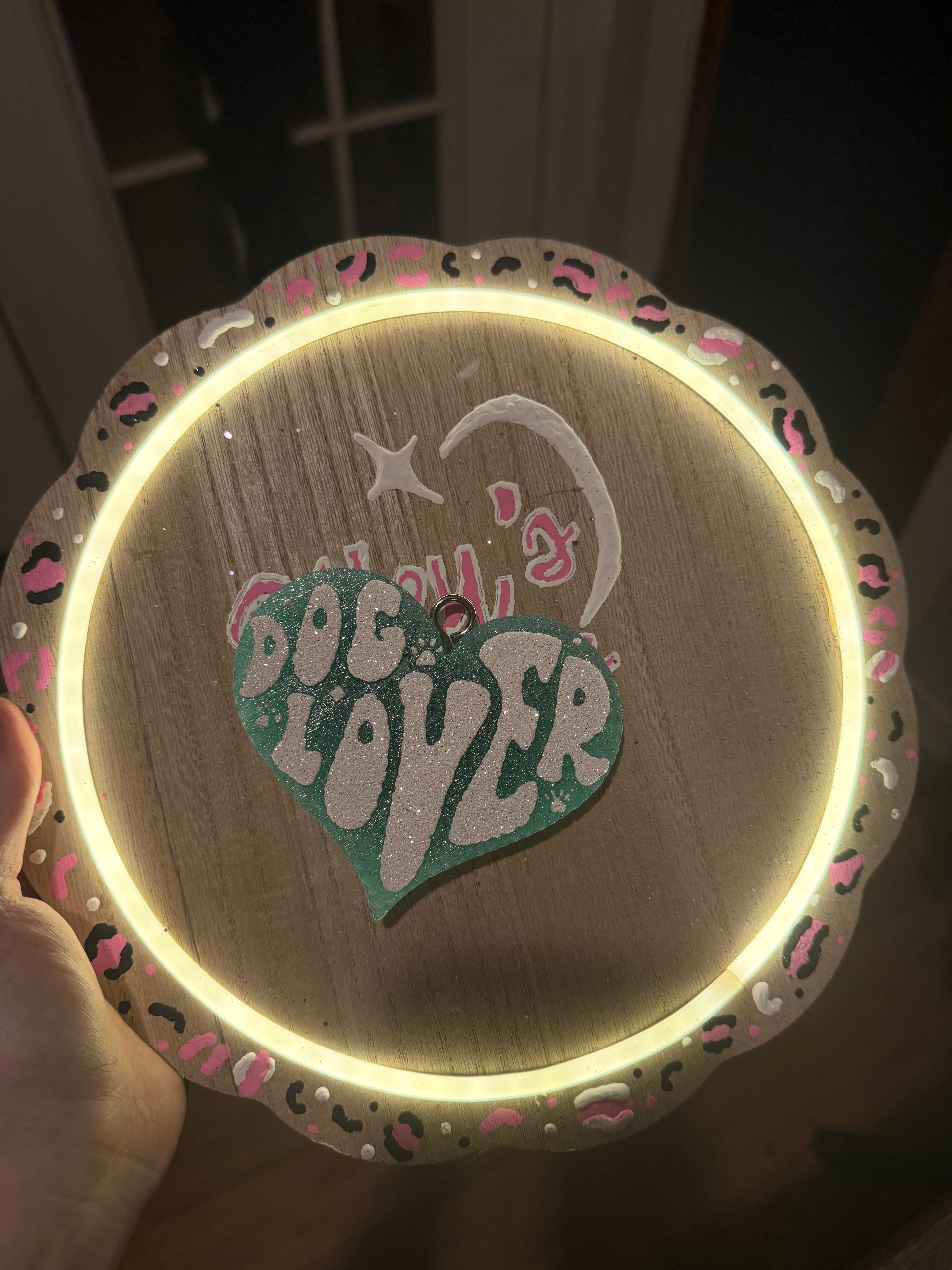 Wooden round sign with 'Dog Lover' design and LED lighting.