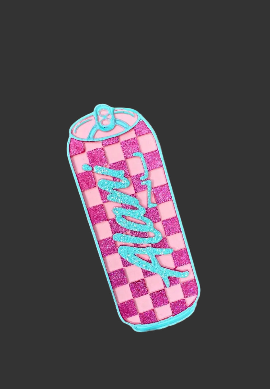 Checkered pink and blue patch with 'Kawaii' text held by a hand against a neutral background
