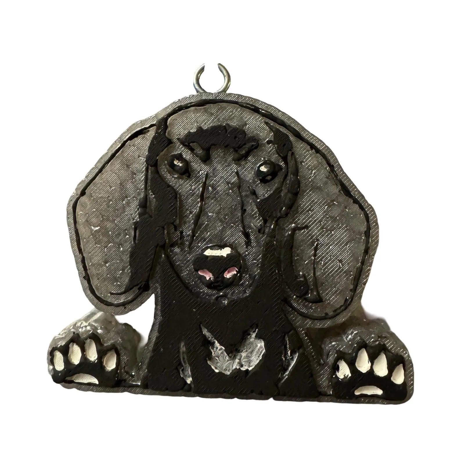 Decorative ornament of a dachshund on a white background